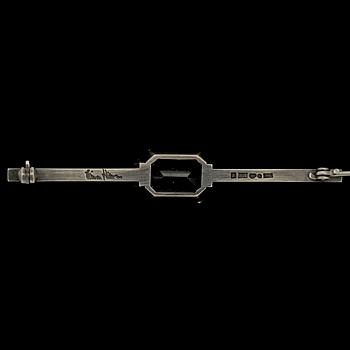BROSCH, sterlingsilver med fasettslipad bergskristall, Wiwen Nilsson, Lund, 1938. Vikt 9 g.