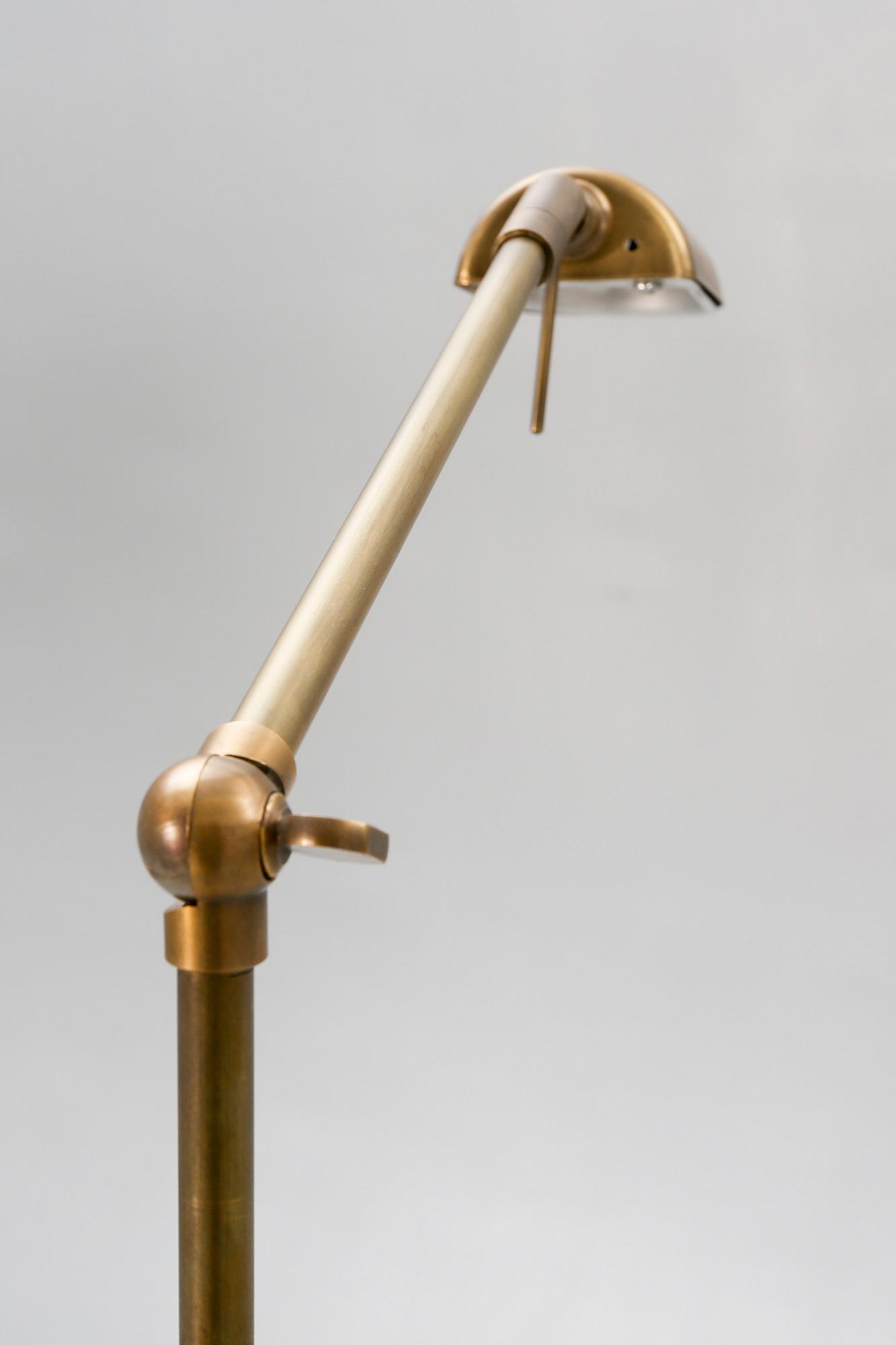 A pair of brass floor lamps 21 st century.