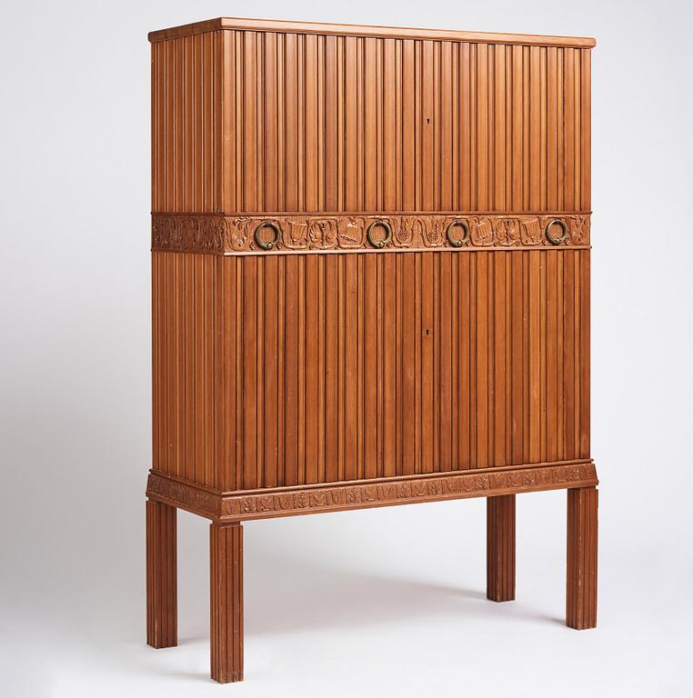 A Swedish Modern stained pine cabinet, 1940s.