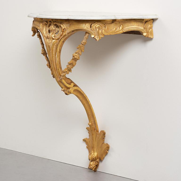 A rococo giltwood and marble console table, Stockholm, later part 18th century.