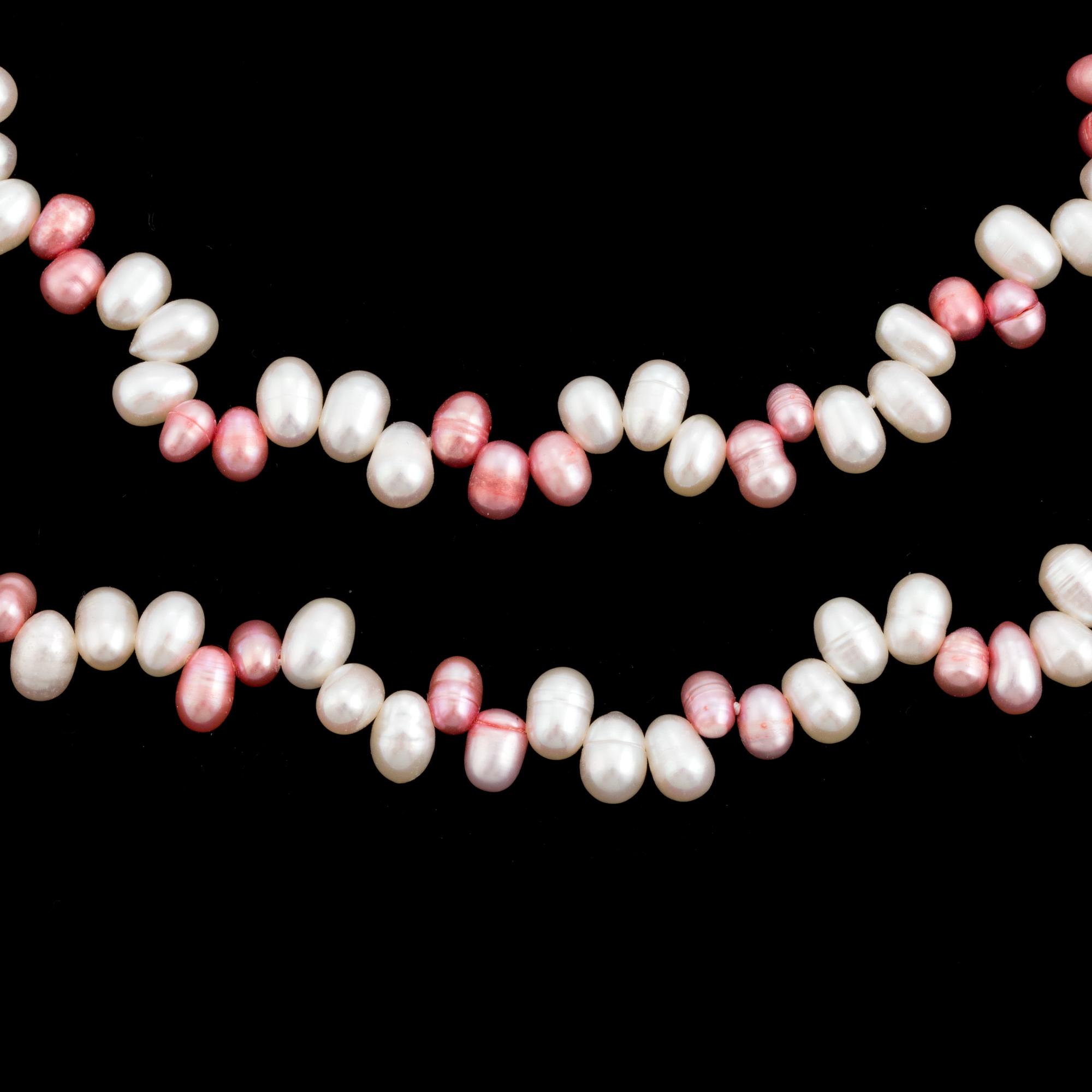 Two necklaces of cultured, freshwater pearls.