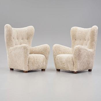 Fritz Hansen, two easy chairs, model "1672", Denmark 1940s.