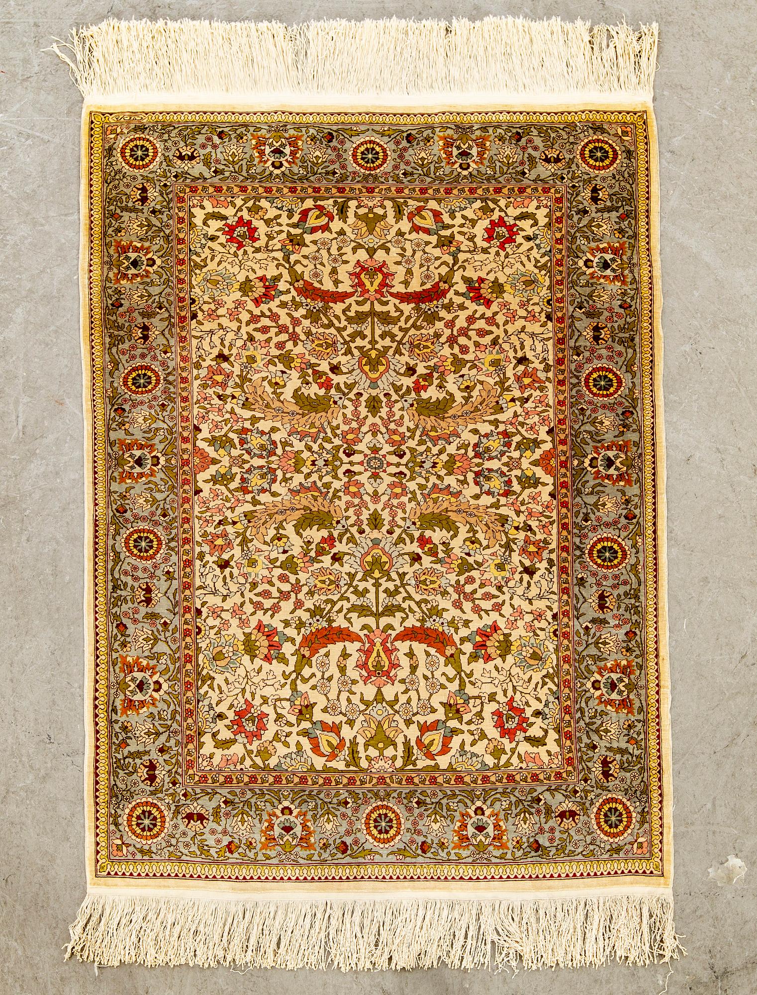A silk Hereke rug. 120x80 cm.