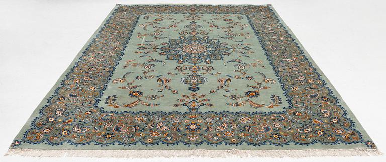 A Keshan carpet, signed, c. 376 x 270 cm.
