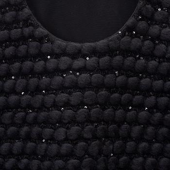 Yves Saint Laurent, a wool and sequin vest, size M.