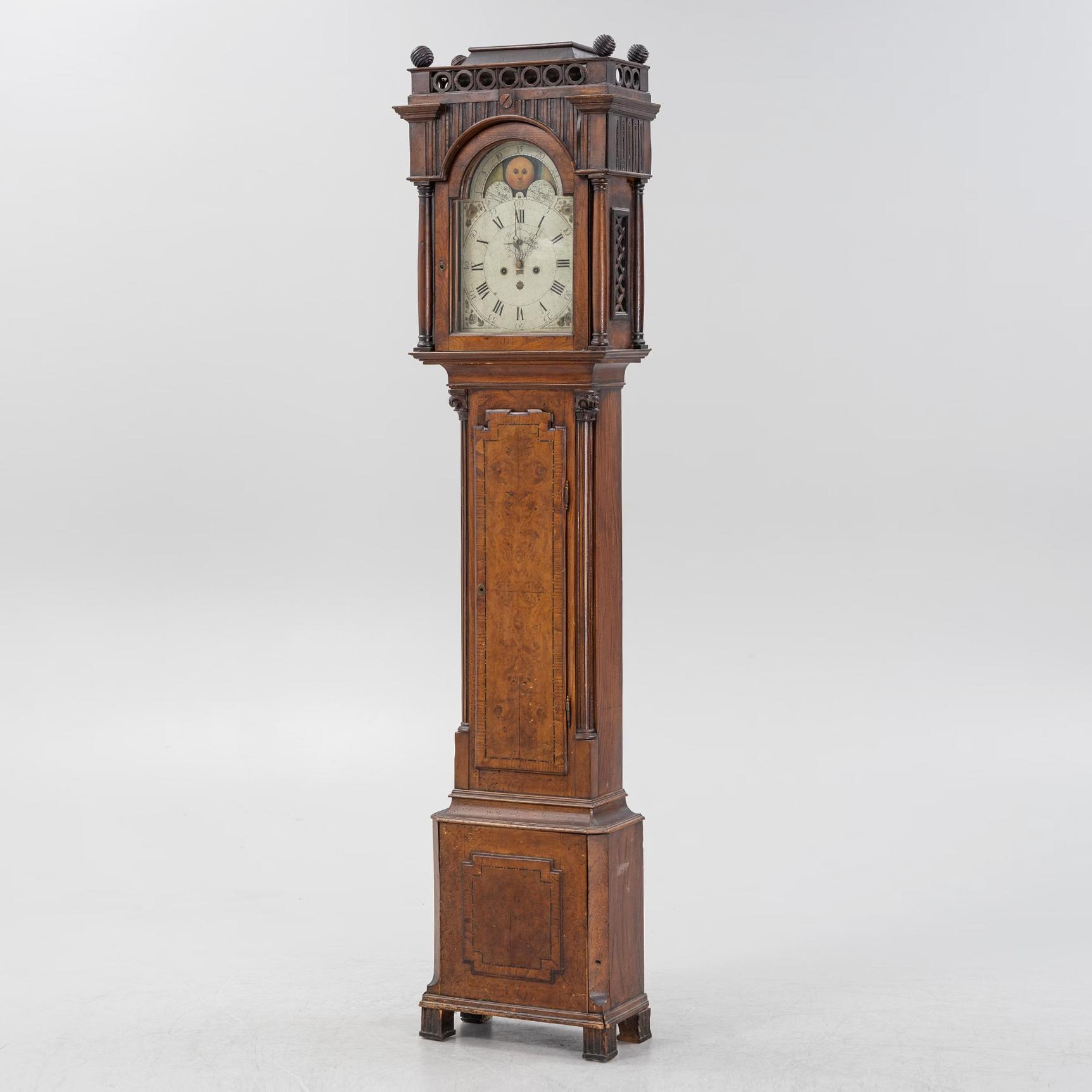 An oak longcase clock, 19th Century.