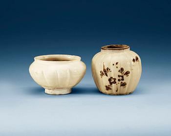 1648. A white glazed bowl and a chizhou vase, Song (960-1279) and Yuan dynasty (1271-1368).