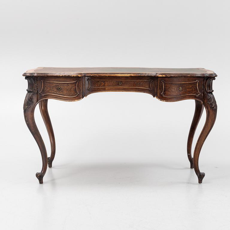 A rococo-style writing desk from the first half of the 20th century.
