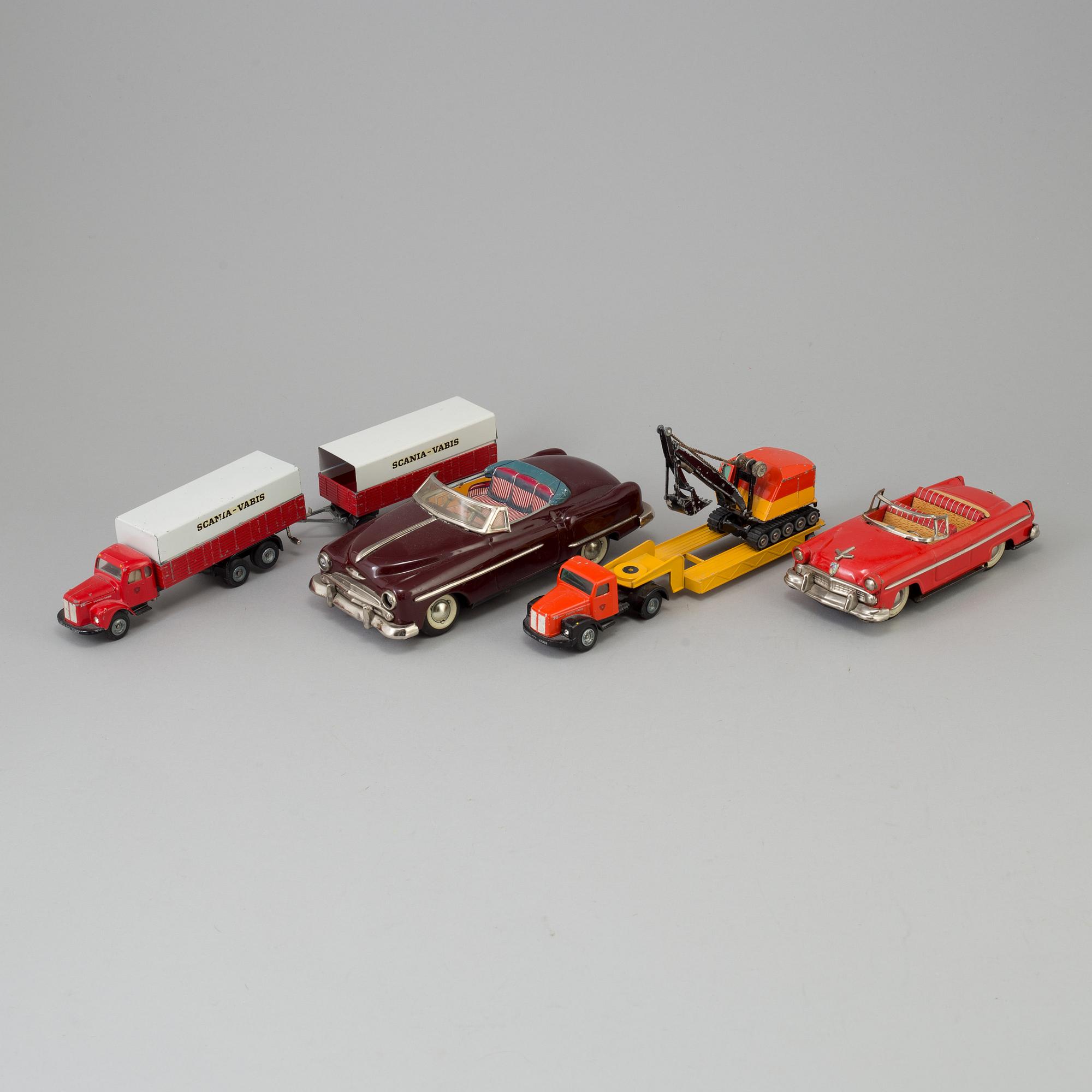 Four toy cars by Tekno and Haji, Germany and Japan.