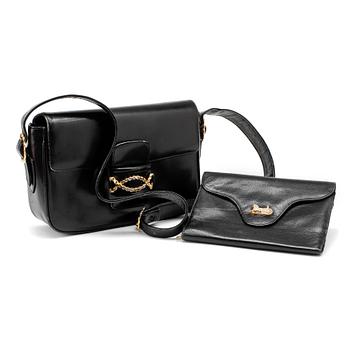546. CÉLINE, a black leather shoulder bag and wallet.