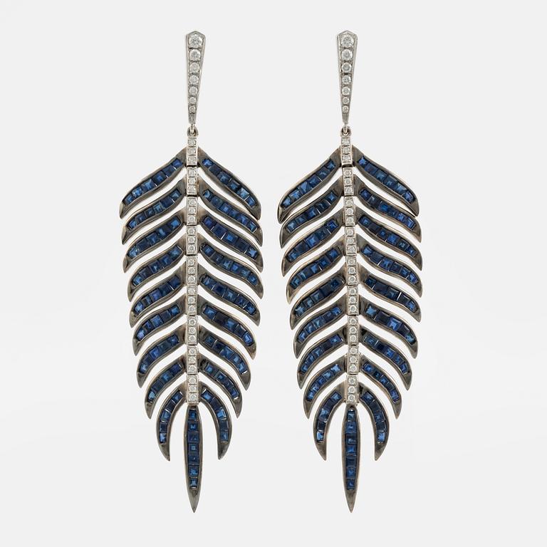 Sapphire and brilliant cut diamond feather earrings.