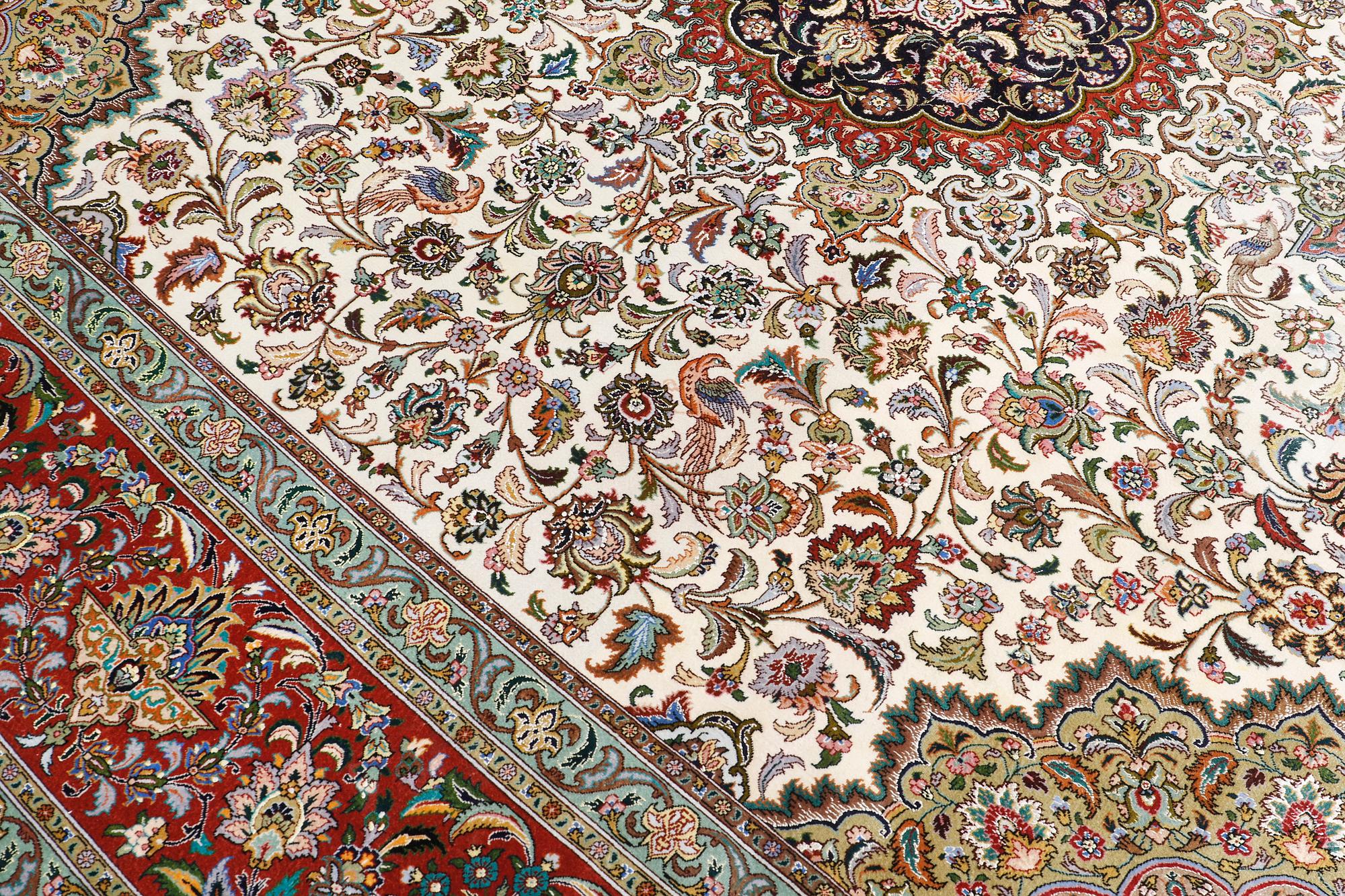 A part silk Tabriz carpet, sk 50 Radj, ca 312 x 296 cm.