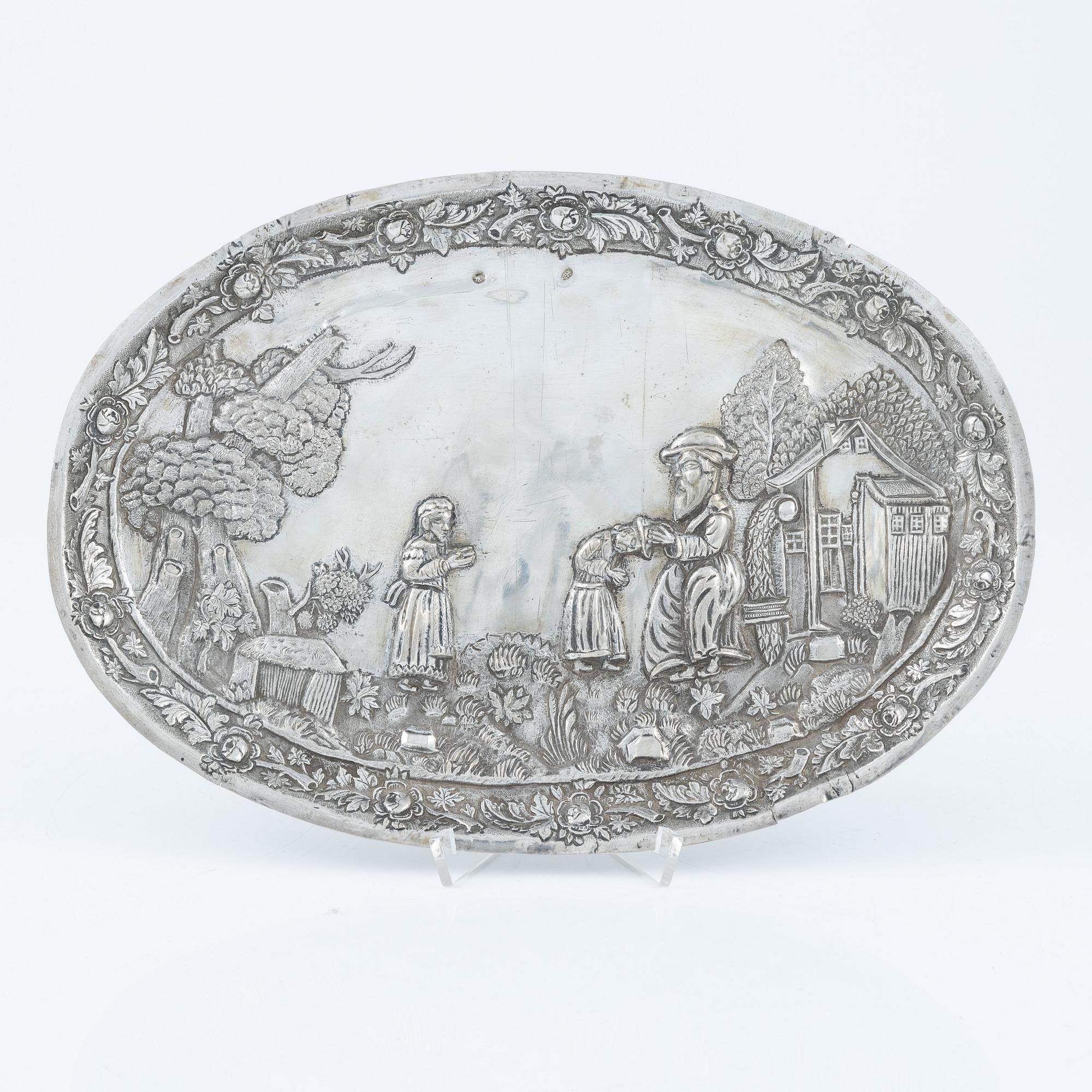 A baroque-style silver dish, 19th century.