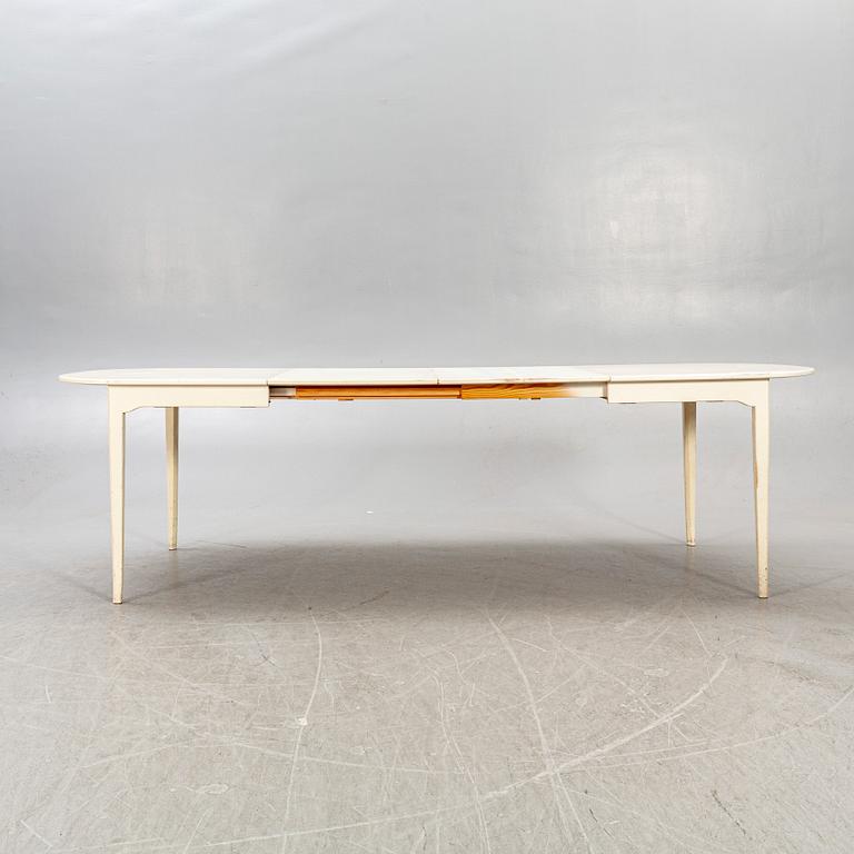 A Carl Malmsten dining table alter part of the 20th century.