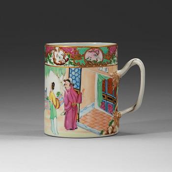 310. A famille rose Canton jug, Qing dynasty, 19th Century.