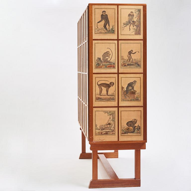 Josef Frank, 'Apskåpet' (The monkey cabinet), a rare cabinet covered with prints of different monkeys, Svenskt Tenn, Sweden ca 1941.