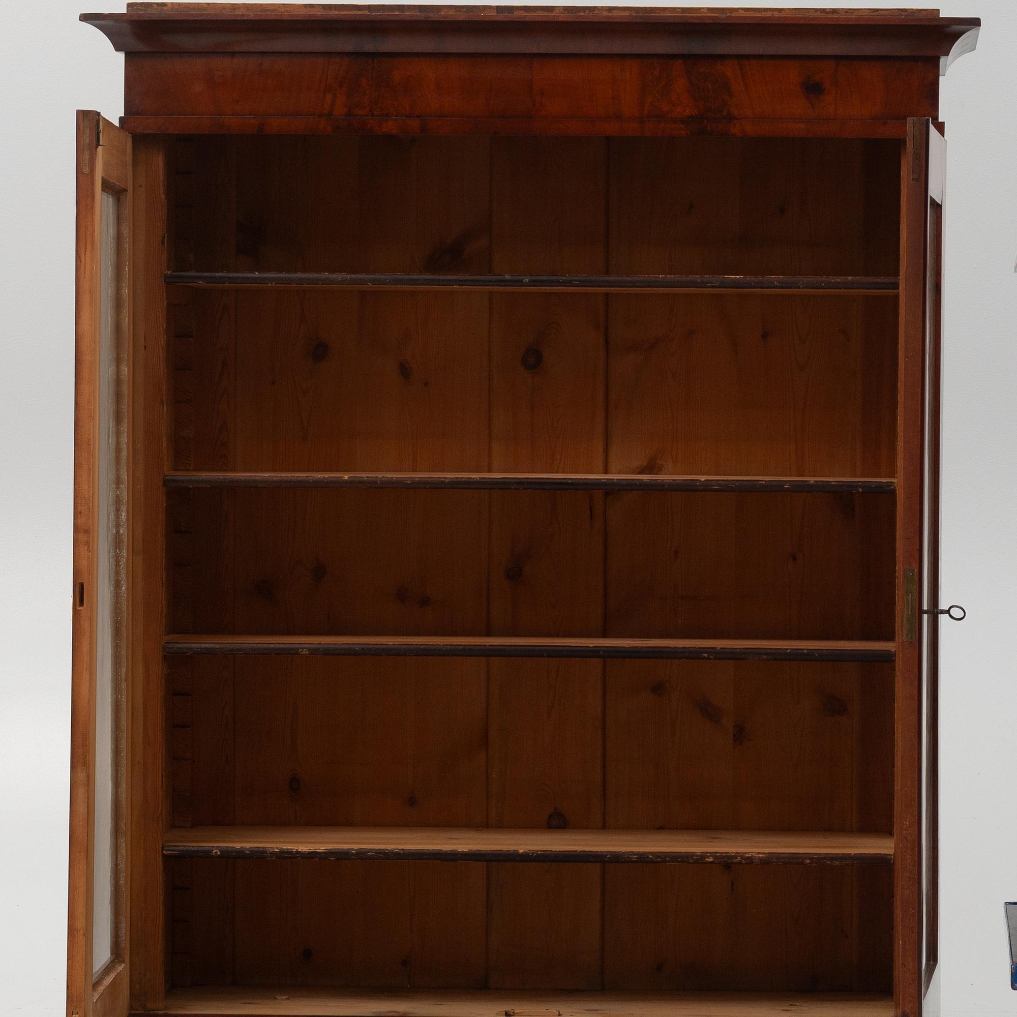 A Swedish Empire Mahogany Cabinet, 19th Century.