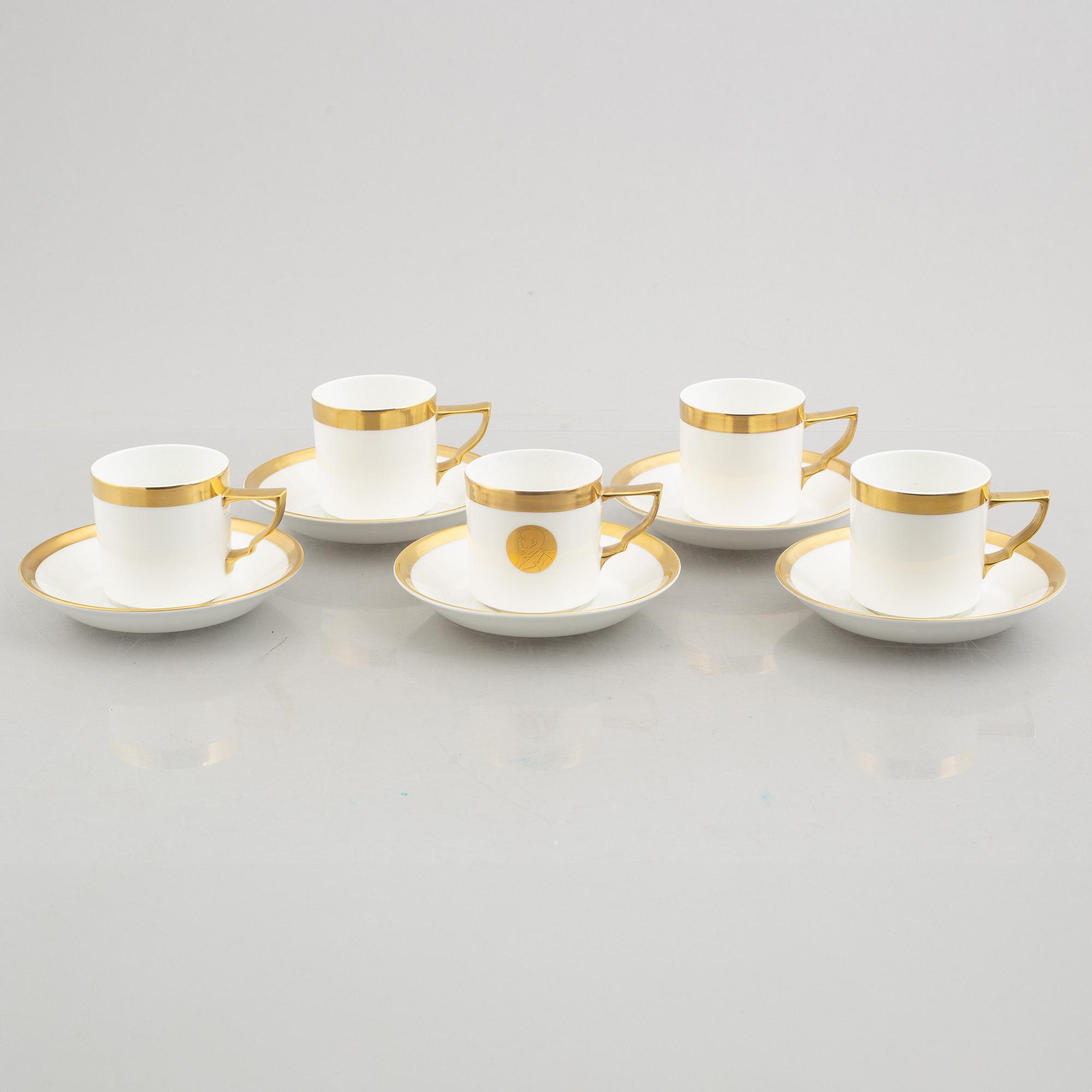 Karin Björquist, five 'Nobel' bone china coffee cups with saucers, Rörstrand.