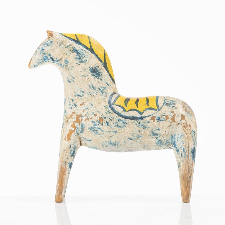 A carved and polychrome painted Dalecarlian horse, circa 1900.