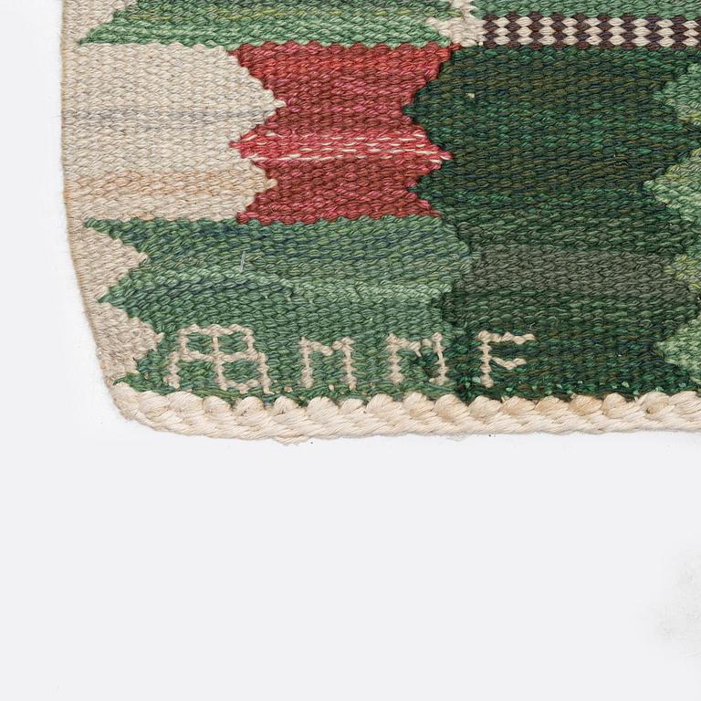 Barbro Nilsson, a carpet 'Nejlikan grön', flat weave, c. 390 x 278 cm, signed AB MMF BN.