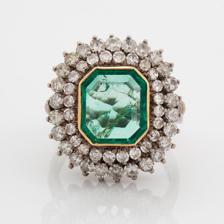 Emerald-cut emerald and eight-cut diamond ring.