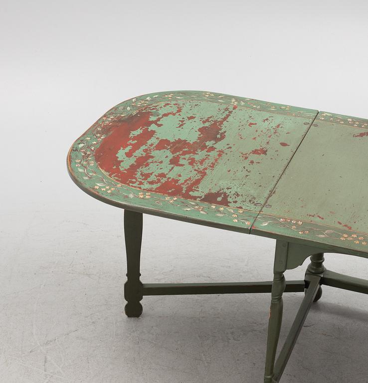 A painted gate leg  table, 19th century.