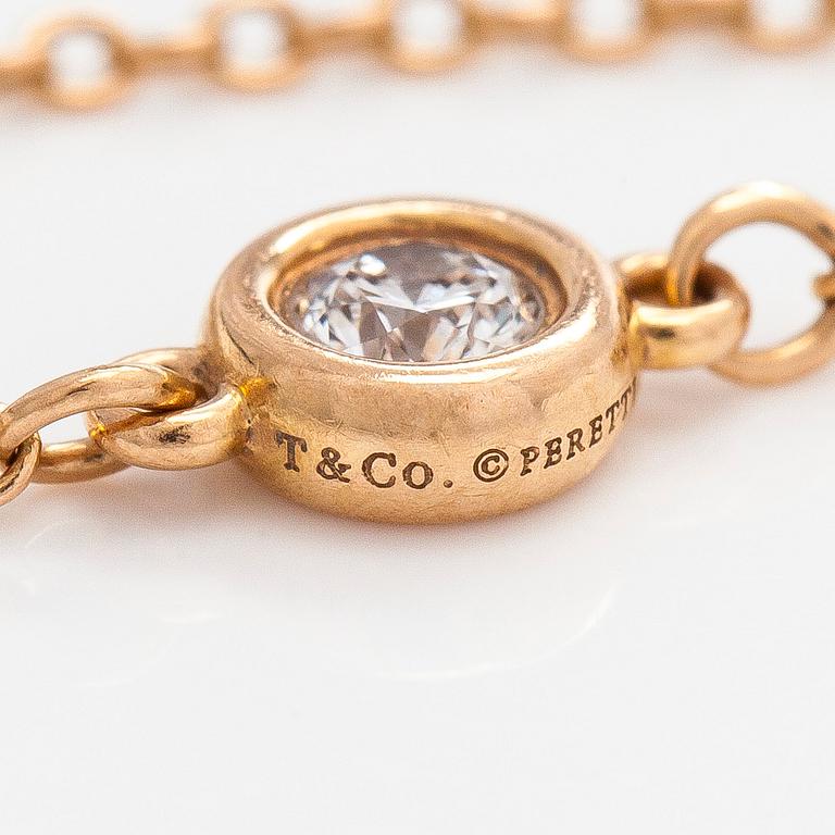 Tiffany & Co, Elsa Peretti, an 18K gold 'Diamonds by The Yard' ring with a brilliant-cut diamond.