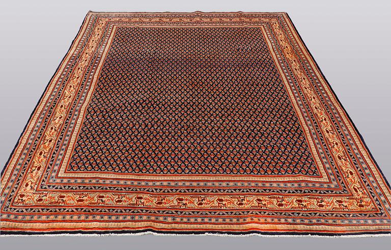 A carpet, Sarouk - Mir, ca 310 x 223 cm.