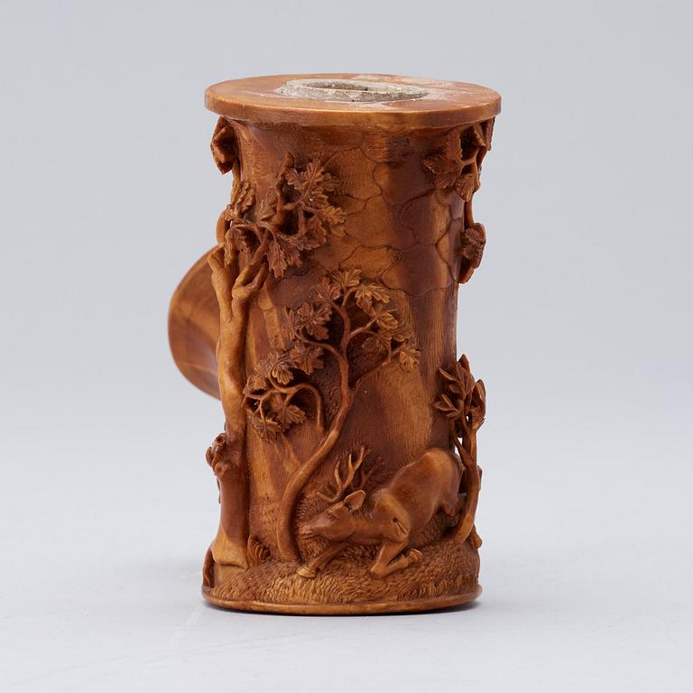 A Swedish 19th century carved wooden pipe bowl by S. Isberg .