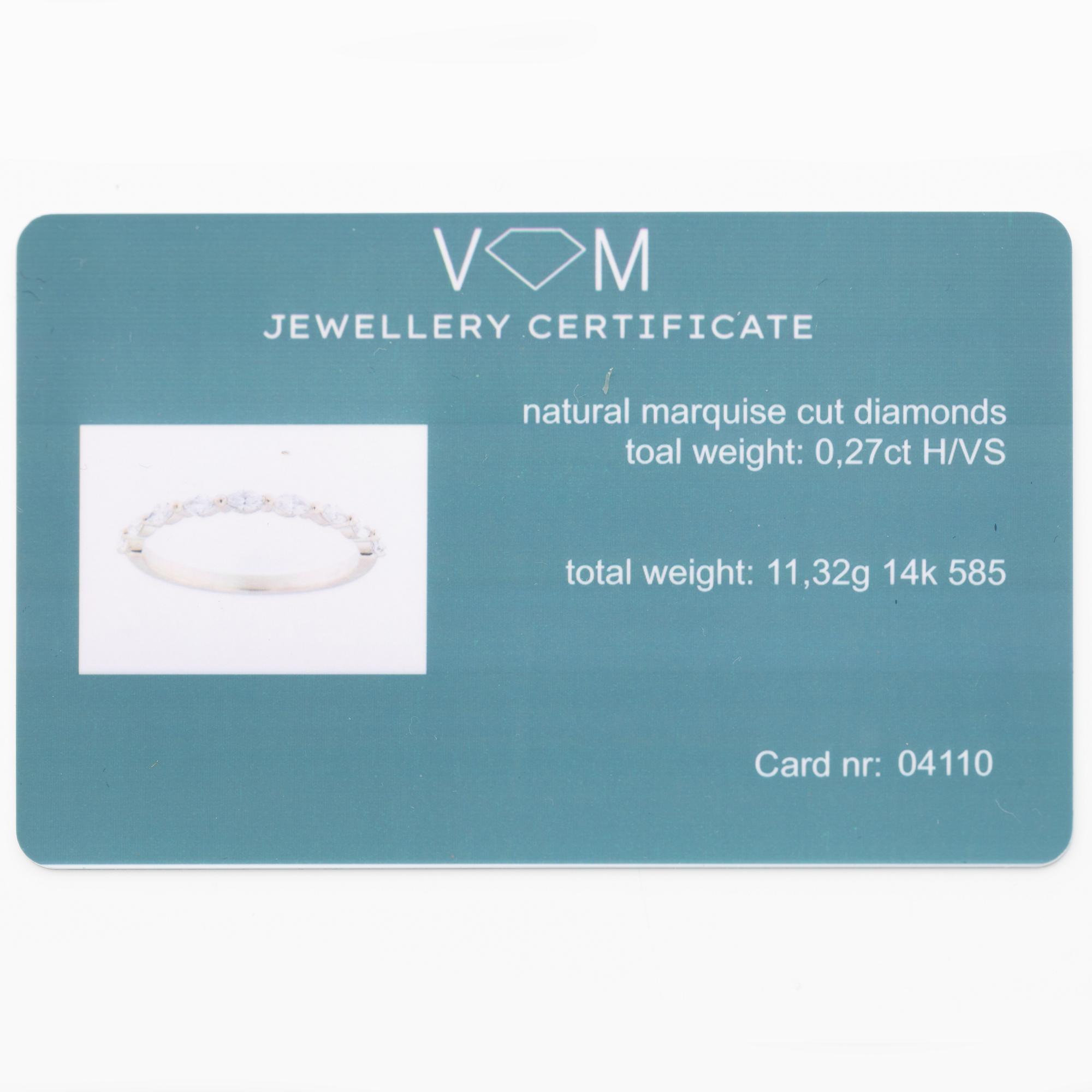 14K gold ring with marquise-cut diamonds.