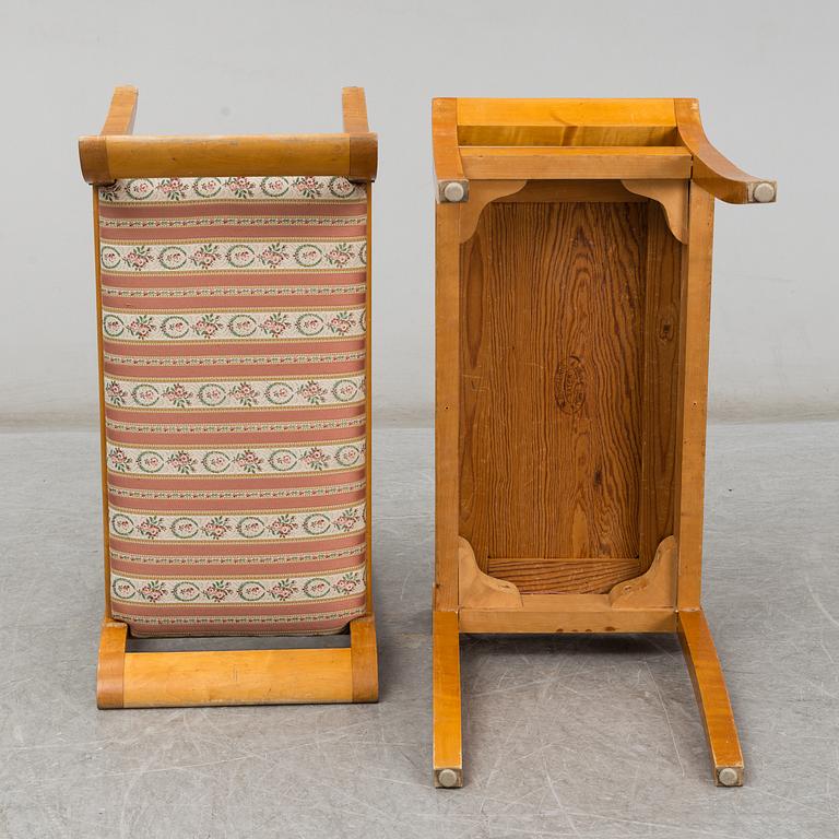 a pair of stools from the first half of the 20th century.