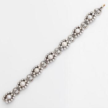 A.Tillander, a platinum necklace/bracelet, with brilliant-cut diamonds totalling approx. 6.72 ct and cultured pearls.