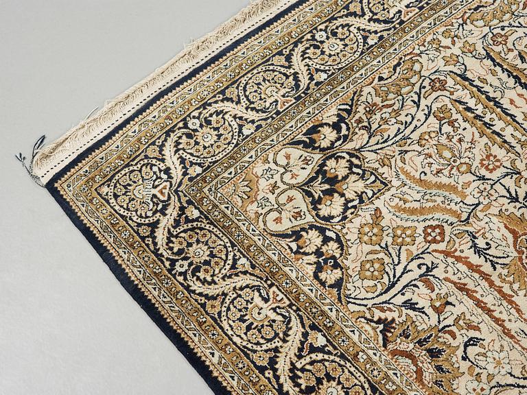 A silk Qum carpet, around  219 x 137 cm.