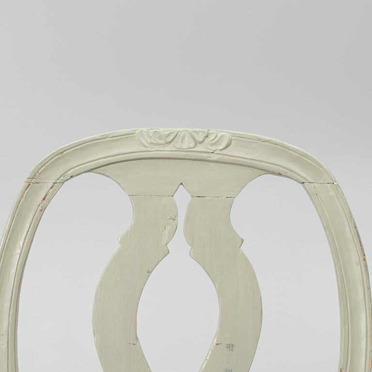 Ten similar Gustavian chairs, Sweden, around the year 1800.