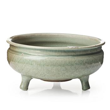 A celadon glazed tripod censer, Ming dynasty (1368-1644).