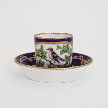 A Sèvres porcelain cup and sacuer, probably 1770's.