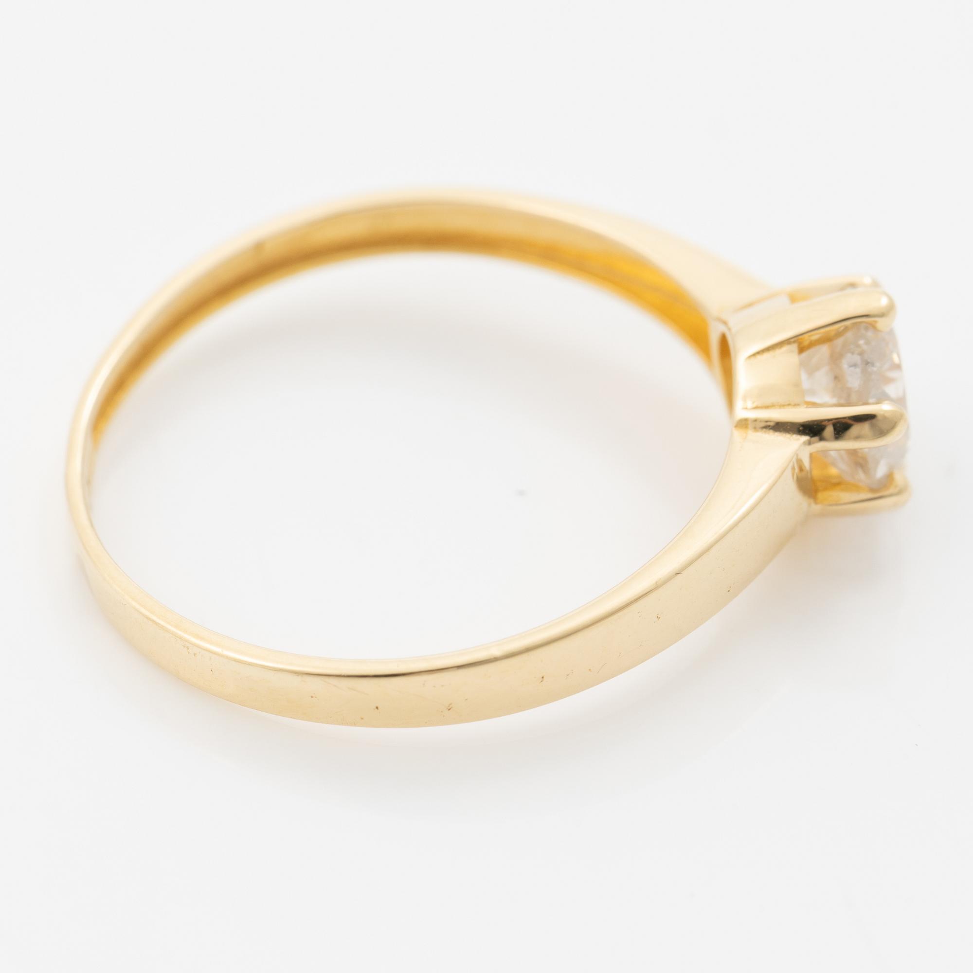 18K gold ring with an old-cut diamond.