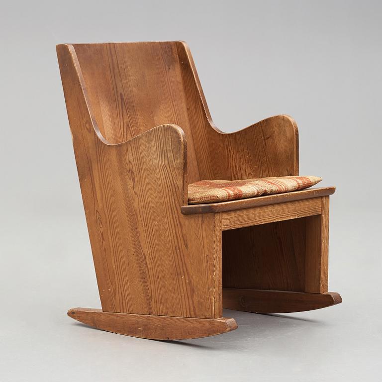 Axel Einar Hjorth, a stained pine "Lovö" rocking chair, Nordiska Kompaniet, Sweden 1930's.