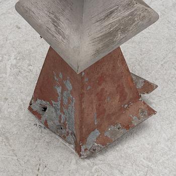 Tower spire with weather vane dated 1912.
