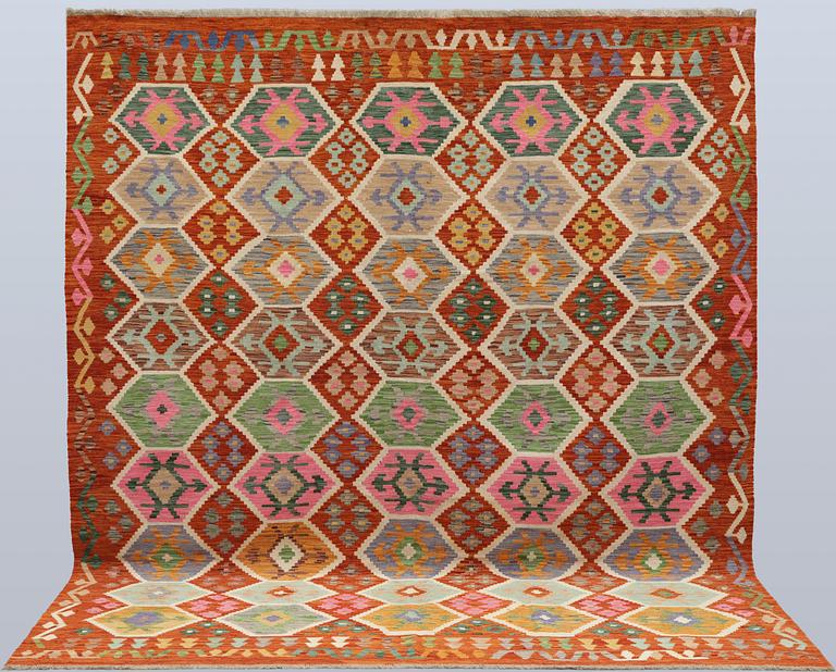 A Kilim carpet, approx. 290 x 253 cm.