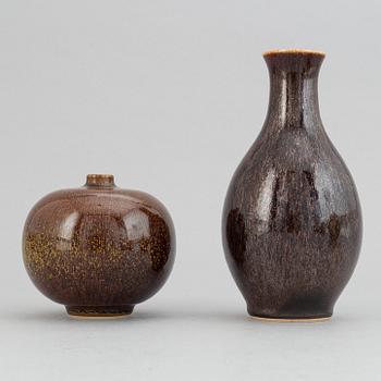 Lasse Östman, a set of four stoneware vases and two bowls.