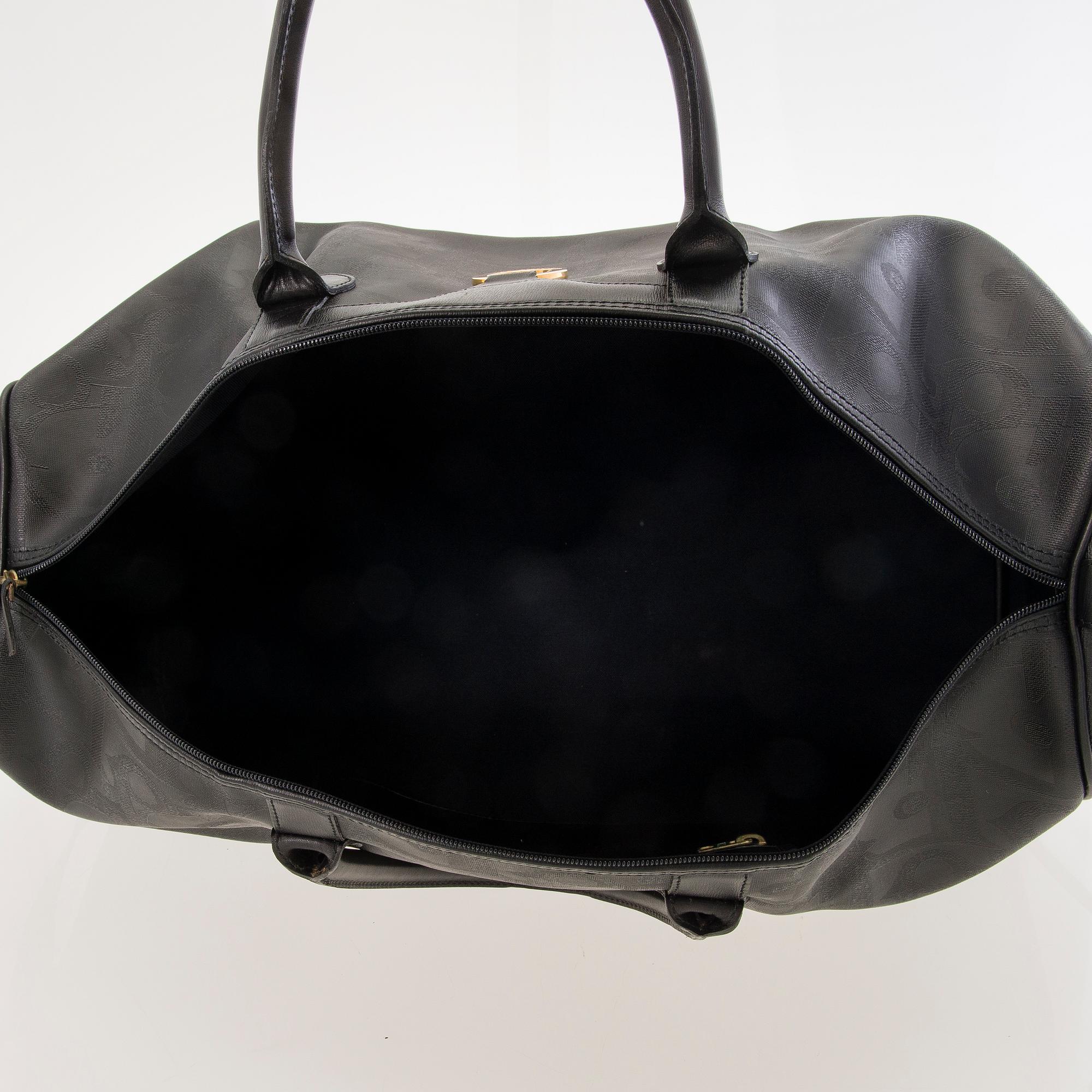 CHRISTIAN DIOR Black Monogram Coated Canvas Duffel Bag.