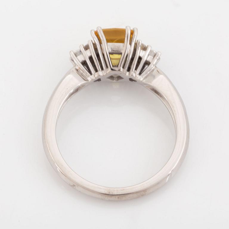 Yellow sapphire and diamond ring.