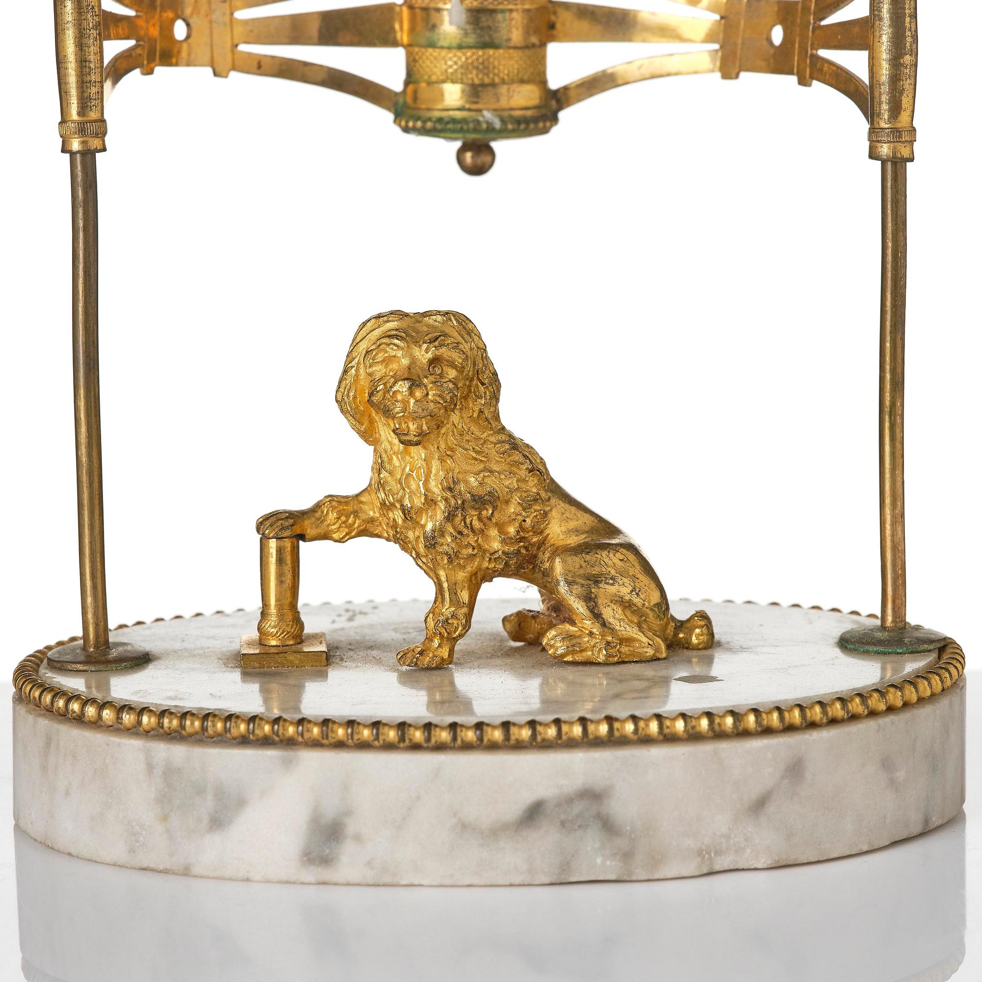 A late Gustavian gilt brass, marble and tole reading lamp, late 18th century.