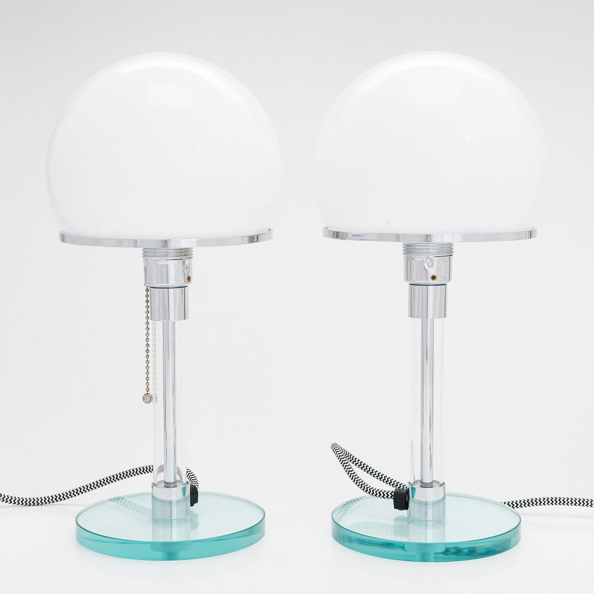 Wilhelm Wagenfeld, a pair of Bauhaus style 'WG24' table lights, Egoluce, Italy, 2000s.