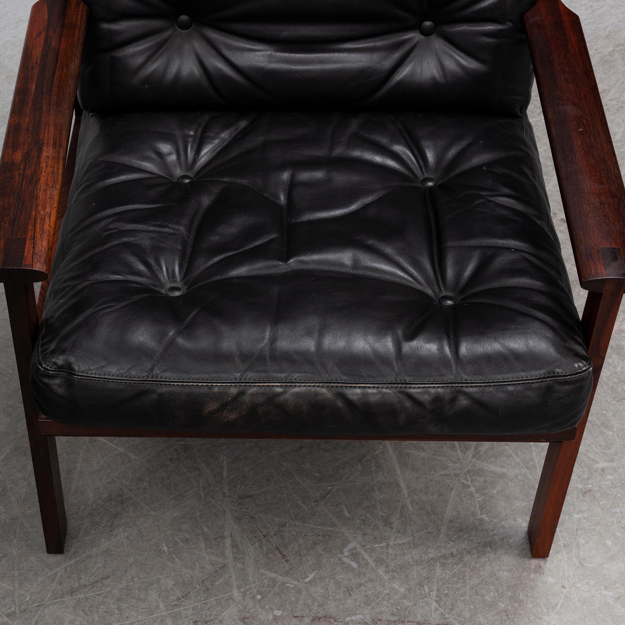 A pair of 'Capella' rosewood easy chairs by Illum Wikkelsø.