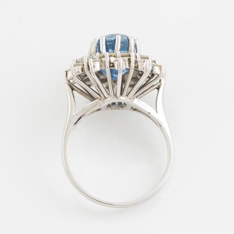 Sapphire and brilliant cut diamond cluster ring.