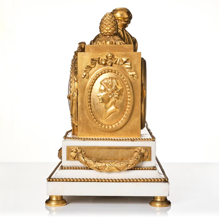 A monumental Louis XVI-style marble and ormolu mantel clock 'à la Geoffrin', first part of the 19th century.