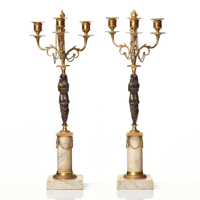 A pair of late Gustavian circa 1800 three-light candelabra.