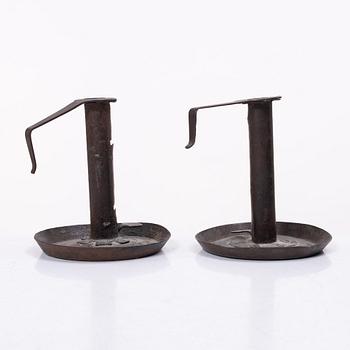 A pair of similar candle holders, 19th century.